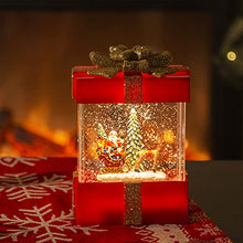Load image into Gallery viewer, EAMBRITE Musical Christmas Snow Globe Lantern with Santa Claus Reindeer Sled Decorations USB Battery Operated Light up Red Box with Gold Bow for Kids Christmas Decoration-18cm